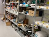 a room filled with lots of boxes and shelves