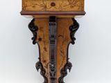 an image of a wooden shelf with a clock on it