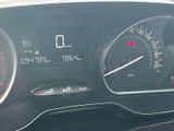 a close up of a car dashboard with a speedometer