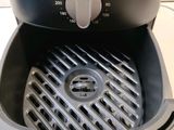 an image of a close up of an air fryer