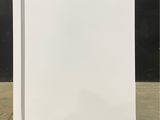 an image of a white refrigerator in a room