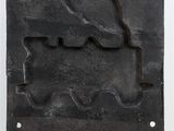 a picture of a metal plaque with a map on it