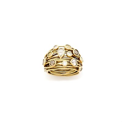 a close up of a gold ring on a white background