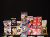 a lot of games and dvds on the table