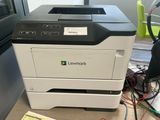 a printer that is sitting on top of a table