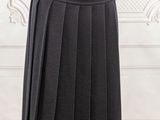 a woman ' s skirt with pleas on a mannequin mannequin mannequin mannequin mannequin mannequin mannequin mann
