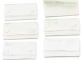 five pieces of paper that are on a white surface