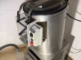 a machine that is sitting in the corner of a room