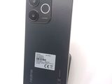 an image of a close up of a cell phone on a stand