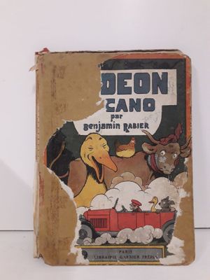 un vieux livre pour enfants sur lequel figure l'image d'un chien et d'un canard