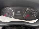 a close up of a dashboard with a speedometer and gauges