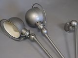three metal objects that are sitting on a table