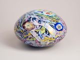 a decorative egg with a floral design on it