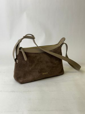 a small brown bag with a strap and a handle on a white background