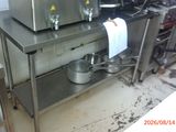 an image of a commercial kitchen with stainless steel appliances