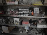 a shelf full of assorted items in a room