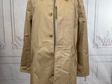 beige trench coat on a mannequin mannequin mannequin mannequin mannequin mannequin mannequin mannequin mannequin