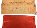 two pieces of cloth with red paint on them and a piece of cloth with red paint on it