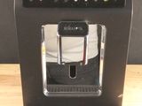 an image of a coffee machine on a wooden table