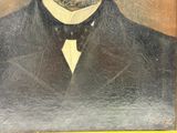 tableau représentant un homme en costume et nœud papillon, portant une moustache