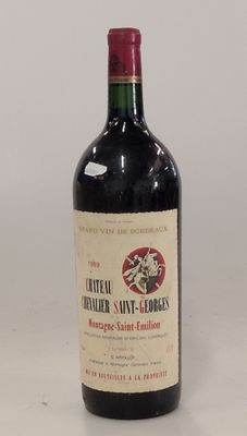 a bottle of wine that is sitting on a table