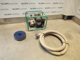 a hose and a hose on the floor next to a wall