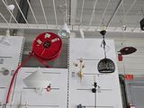 a red fire hydrant in the middle of a room