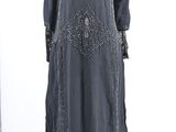an image of a woman ' s dress on a mannequin stand
