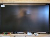 a picture of a blackboard in a wooden frame