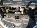 the engine of a car with its hood open and the hood open