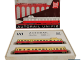 a box with three train cars in it