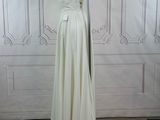 an image of a dress on a mannequin stand