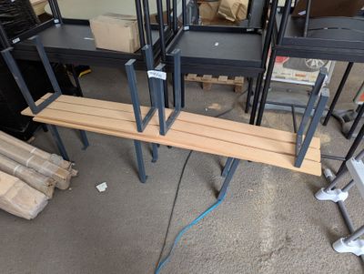 many pieces of wood stacked on top of each other