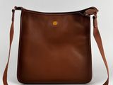 a brown leather shoulder bag with a brown strap