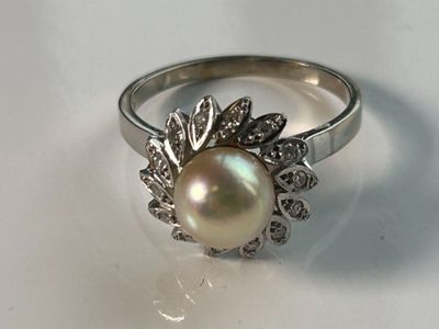 Bague en or blanc 750 millièmes agrementée d'une perle de culture dans - Photo 1