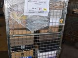 a metal cart with many boxes on it in a warehouse
