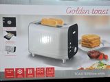 image encadrée représentant un grille-pain avec une tartine posée dessus, sur une table