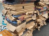 a large pile of boxes sitting on top of a pile of boxes
