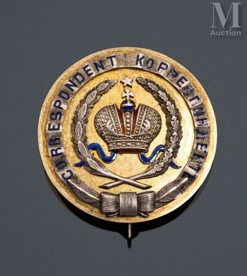 an image of a metal badge with a crown on top of it