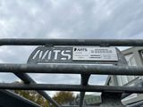 a sign on the back of a truck that says mtts