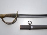 an image of a sword with a long handle and a long blade