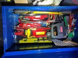 a blue box with a bunch of tools inside of it