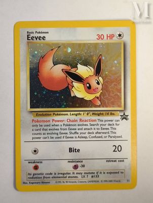a close up of a pokemon card on a white surface