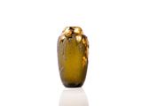 a green glass vase with a gold decoration on it