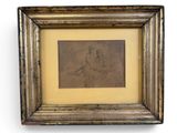 an old picture frame with a drawing of a woman in a dress