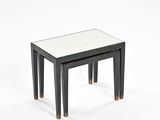 pair of black and white nesting tables with mirrored top