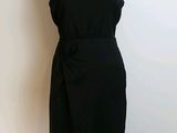 a picture of a dress on a mannequin stand