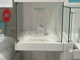 a display case with a lot of items in it