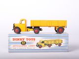 a toy truck that is sitting on top of a box