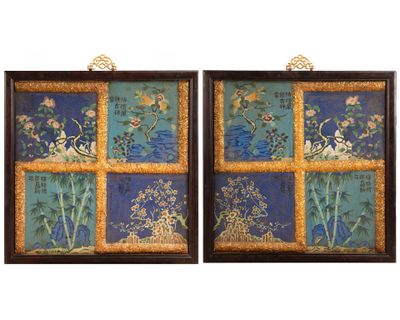 two framed paintings of flowers and birds on a blue background
